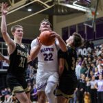 With star guard Carr sidelined, Baldwin boys upended by Paola in hoops opener